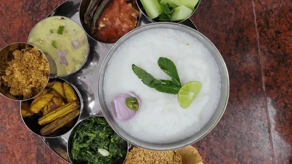 Pakhala bhata, fermented rice in water with fried sides